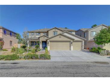Charming two-story home featuring a three-car garage, neutral paint scheme and well-manicured landscaping at 3632 Red Fir St, Las Vegas, NV 89135