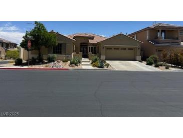 Charming one-story home with desert landscaping and a two-car garage in a well-maintained neighborhood at 7524 Midnight Rambler St, Las Vegas, NV 89149