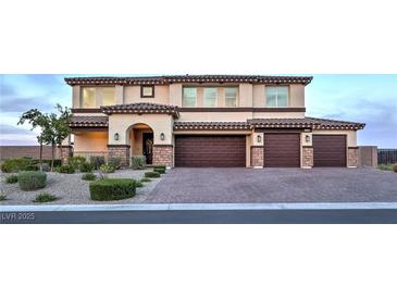 Stunning two-story home featuring a spacious three-car garage and meticulously landscaped front yard at 5328 Hickory Tree St, Las Vegas, NV 89149