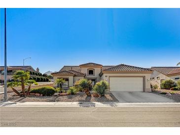 Beautiful single-story home with desert landscaping and a two-car garage at 2801 Byron Dr, Las Vegas, NV 89134