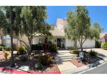 Charming single-Gathering home with mature landscaping and a welcoming entrance at 5041 Portraits Pl, Las Vegas, NV 89149