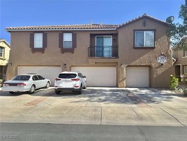 Spacious two-story home with three-car garage and well-maintained landscaping at 1355 Grass Creek Ave # 1, Henderson, NV 89012