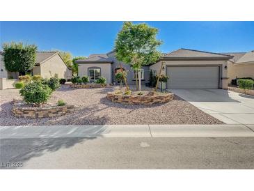 Charming single-story home with a well-manicured desert landscaped front yard at 2261 Evening Lights St, Henderson, NV 89052