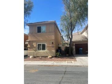 Charming two-story home features a low maintenance front yard and guest parking at 5280 Shreve Ave, Las Vegas, NV 89156