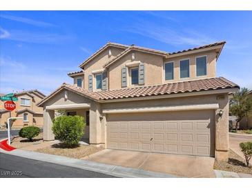 Charming two-story home features a spacious two-car garage and a well-maintained front yard at 10468 Concetta Ave, Las Vegas, NV 89129