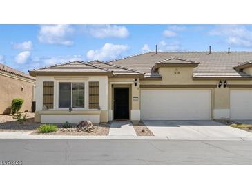 Charming single-story home featuring a two-car garage and low-maintenance landscaping at 2453 Vivid Sky Pl, Henderson, NV 89044