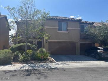 Beautiful two-story home featuring a two-car garage and well-maintained landscaping at 5507 Gemini Bridges St, Las Vegas, NV 89130