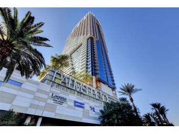 Modern high rise exterior featuring palm trees and upscale commercial spaces on the bottom level at 4381 W Flamingo Rd # 1206, Las Vegas, NV 89103