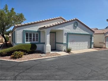 Charming single-story home with a well-maintained yard and attached two-car garage at 5099 Mascaro Dr, Las Vegas, NV 89122