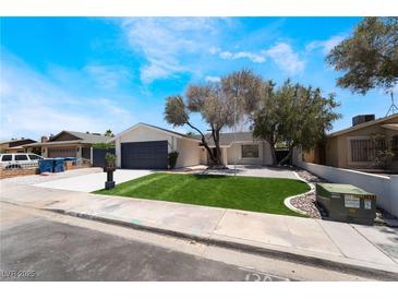Charming single-story home with well-maintained landscaping and a two-car garage at 3572 Tempe St, Las Vegas, NV 89103