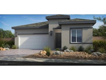 Contemporary home featuring a two-car garage and desert landscaping at 4130 E Brusca Way, Pahrump, NV 89061