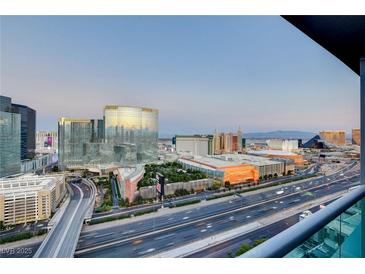 Expansive Las Vegas city view featuring several hotels and buildings from a high vantage point at 4525 Dean Martin Dr # 2901, Las Vegas, NV 89103