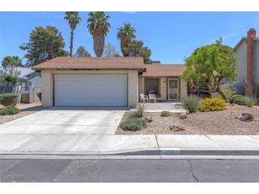 Charming single-story home with a two-car garage and desert landscaping at 4916 Carmichael Ave, Las Vegas, NV 89110