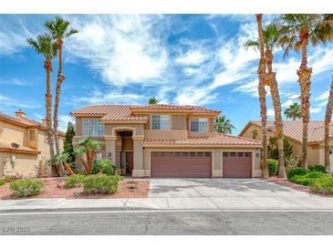 Beautiful two-story home boasts a three-car garage and manicured landscaping with swaying palm trees against a vibrant sky at 2741 Chokecherry Ave, Henderson, NV 89074