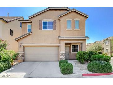Charming two-story home features a two-car garage and well-manicured landscaping in a desirable neighborhood at 7963 Cape Brett St, Las Vegas, NV 89131