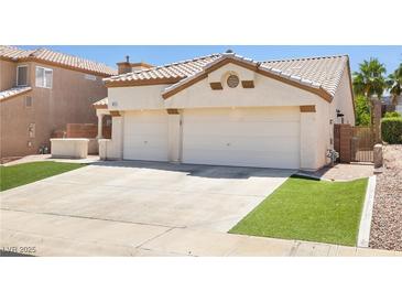 Charming single-story home featuring a two-car garage and well-maintained landscaping at 1515 Horizon Crest Ct, Henderson, NV 89012