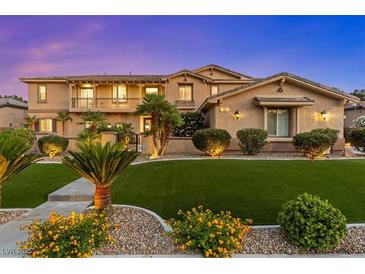 Stunning home with well-maintained lawn and landscaping at 7001 Via Locanda Ave, Las Vegas, NV 89131