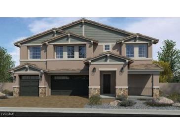 Stunning two-story home showcasing a three-car garage, stone accents and complementary color palette at 7709 Serenity Bay Ln # 56, North Las Vegas, NV 89084