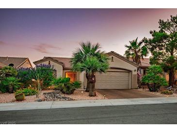 Charming single-story home featuring a two-car garage, desert landscaping and inviting curb appeal at 499 Eagle Vista Dr, Henderson, NV 89012
