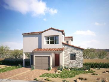 Charming two-story home with a mix of stucco and stone, complemented by desert landscaping and a brick driveway at 1808 Mangrove Ct, Las Vegas, NV 89138