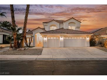 Stunning two-story home with a three-car garage and well-maintained landscaping at 8104 Bay Harbor Dr, Las Vegas, NV 89128