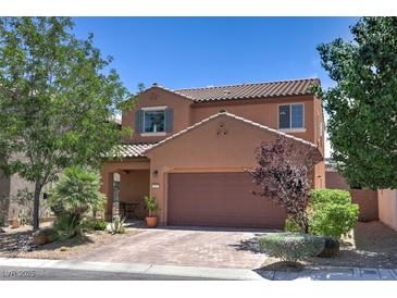 Charming two-story home showcasing a well-maintained front yard and inviting curb appeal at 2373 Rue Royale St, Henderson, NV 89044