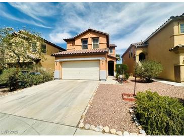 Charming two-story home with a well-maintained front yard and an attached two-car garage at 8156 Blue Hope Diamond Ln, Las Vegas, NV 89139