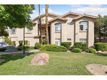 Beautiful home exterior with a well manicured lawn and desert landscaping at 2050 W Warm Springs Rd # 224, Henderson, NV 89014