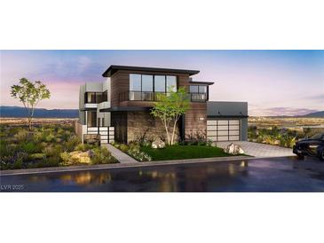 Stunning contemporary home featuring modern architecture, sleek lines, and a beautifully landscaped front yard at 523 Overlook Rim Dr, Henderson, NV 89012