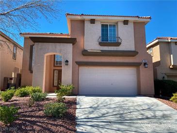 Charming two-story home showcasing a well-manicured front yard and a spacious two-car garage at 533 Via Santiago St, Las Vegas, NV 89144