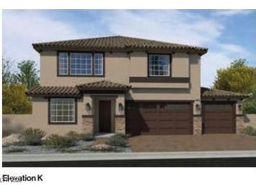 Two-story home with a tile roof, stucco siding, and a two-car garage at 7713 Serenity Bay Ln # Lot 55, North Las Vegas, NV 89084