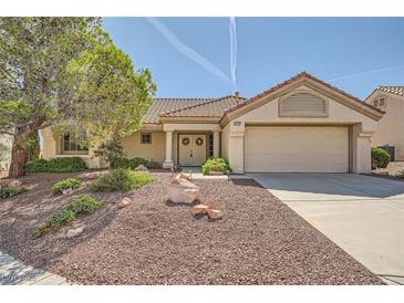 Charming single-story home featuring a well-maintained lawn and a two-car garage at 3104 Hayden Ct, Las Vegas, NV 89134
