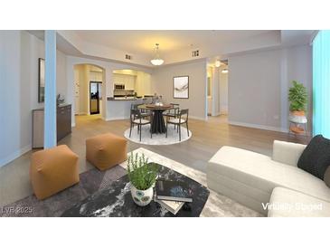 Bright living area with stylish furnishings and modern decor for comfortable, sophisticated living at 38 E Serene Ave # 432, Las Vegas, NV 89123