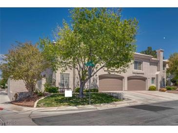 Spacious two-story home featuring a two-car garage and mature landscaping at 500 Quail Bird Pl, Henderson, NV 89052