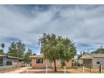 Charming single story home with a mature tree in front yard at 240 N 19Th St, Las Vegas, NV 89101