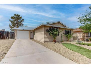 Charming single-story home with a driveway, a one-car garage and desert landscaping at 4739 Glenndavis Dr, Las Vegas, NV 89121