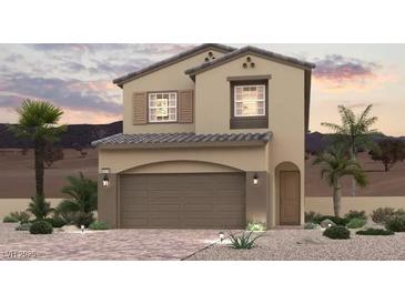 Charming two-story home with a two-car garage and desert landscaping at 872 Pointe Arbor St, Henderson, NV 89011