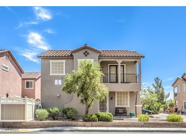 Charming two-story home with desert landscaping and a cozy front porch at 982 Sable Chase Pl, Henderson, NV 89011