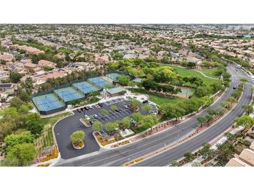 Beautiful aerial view of community park with tennis and basketball courts in a residential neighborhood at 10952 Napa Ridge Dr, Las Vegas, NV 89144