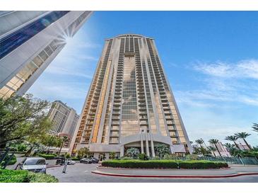 Striking high-rise showcases sleek architecture, private balconies, and a meticulously landscaped entrance at 135 E Harmon Ave # 1401, Las Vegas, NV 89109
