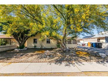 Charming home with mature trees and landscaping in a well-established neighborhood at 136 Elm St, Henderson, NV 89015