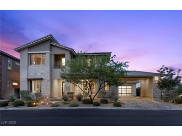 Charming two-story home with professionally landscaped front yard and covered garage at 2890 Reverence Heights Ln, Las Vegas, NV 89138