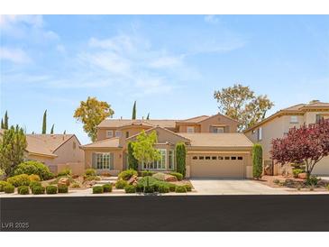 Charming single-Gathering home featuring a well-manicured lawn and a spacious two-car garage at 3535 Coventry Gardens Dr, Las Vegas, NV 89135