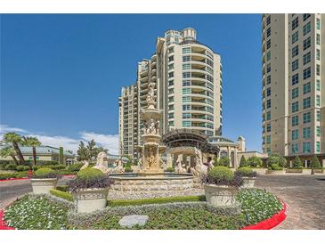 Luxury high-rise residence featuring meticulously landscaped grounds and elegant fountain, offering an upscale living experience at 9101 Alta Dr # 1203, Las Vegas, NV 89145