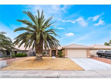 Charming single-story home with desert landscaping and a spacious two-car garage at 4719 Sparta Way, North Las Vegas, NV 89032