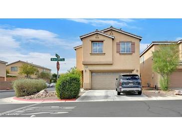 Charming two-story home featuring a two-car garage and well-maintained landscaping in a suburban neighborhood at 9010 Wine Cellar Ave, Las Vegas, NV 89148