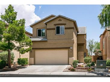 Charming two-story home with a well-maintained yard, two car garage, and desert landscaping at 9712 Red Horse St, Las Vegas, NV 89143