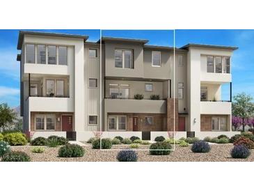 Modern three-story townhome featuring a sleek design and well-maintained landscaping at 1537 Stone Perch St, Las Vegas, NV 89138