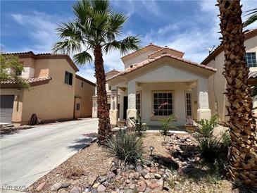 Charming single-story home with desert landscaping and a covered porch, perfect for enjoying the outdoors at 5524 Markley Ave, Las Vegas, NV 89141
