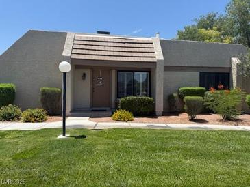 Charming single story home with well maintained landscaping and an inviting front entrance at 3368 Saddleback Ct, Las Vegas, NV 89121